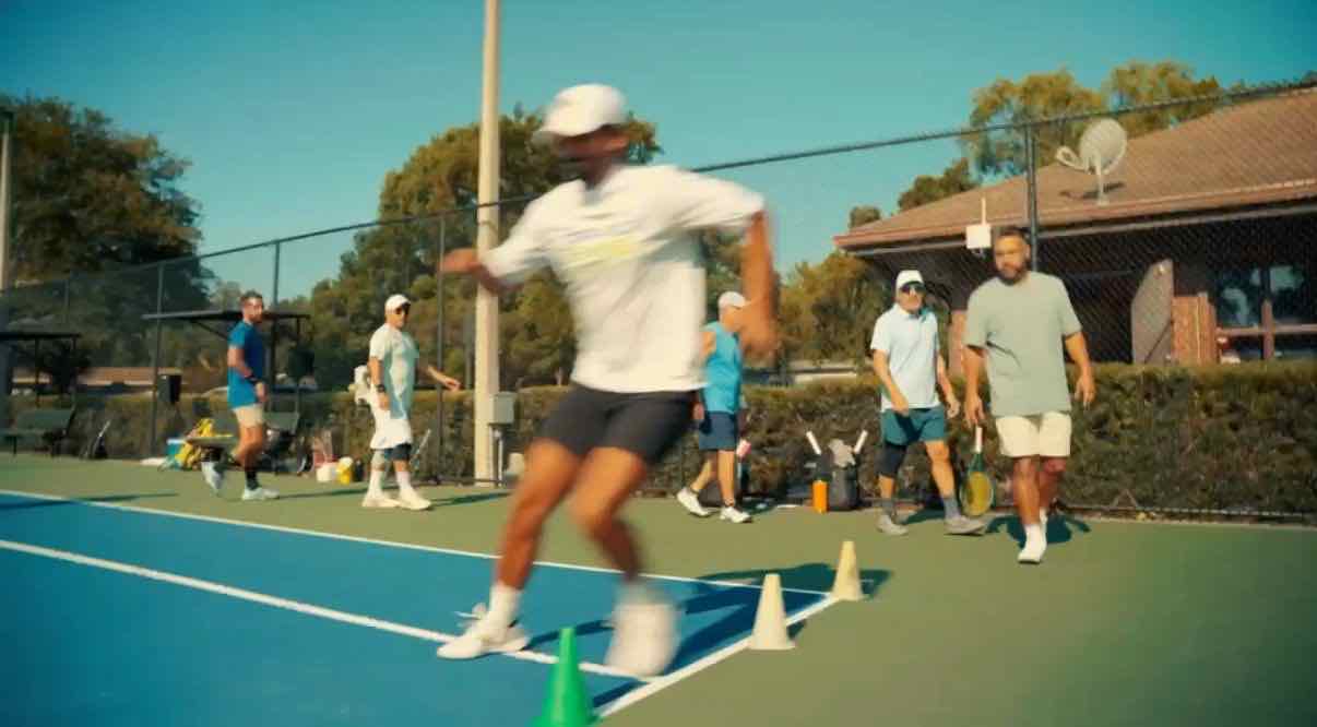 Players doing footwork drills during cardio tennis